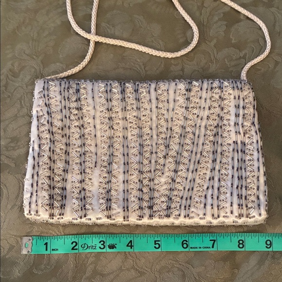Elegant White and Gray Woven Clutch - Picture 2 of 5